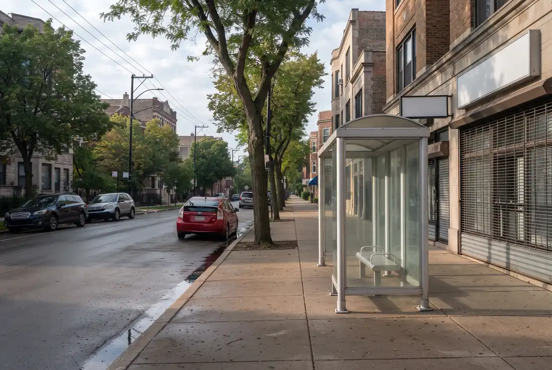 Quiet Chicago street on a Sunday morning with a bus stop shelter